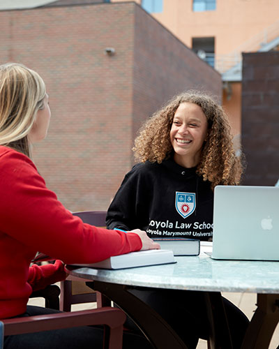 2 students at the table