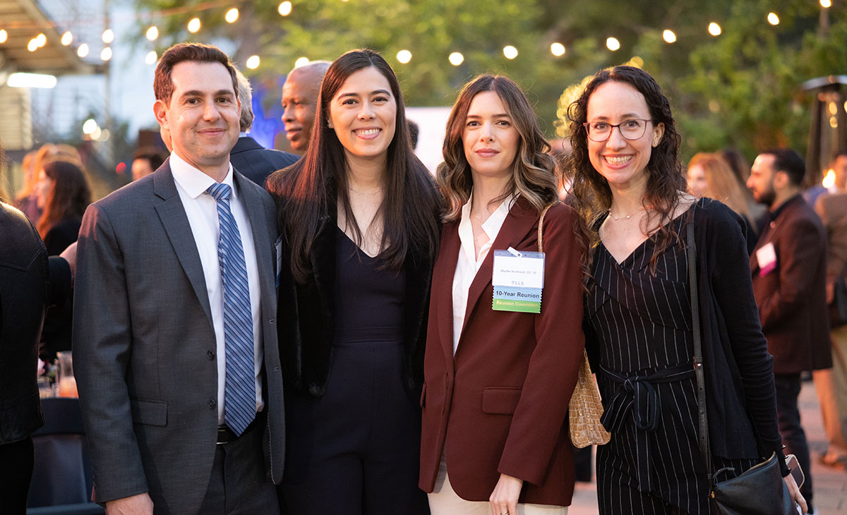 Four LMU Loyola Law School alumni and guests at LLS Grand Reunion.